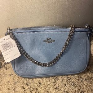 Baby blue COACH wristlet